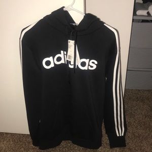 Large addidas black hoodie with white stripes.